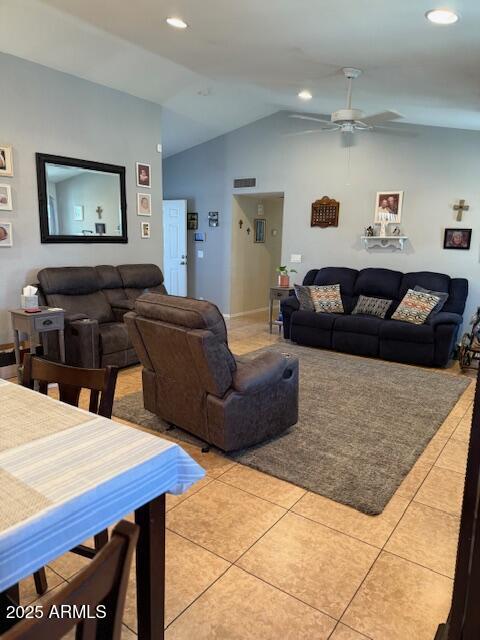 living room featuring light tile patterned floors, vaulted ceiling, a ceiling fan, and recessed lighting
