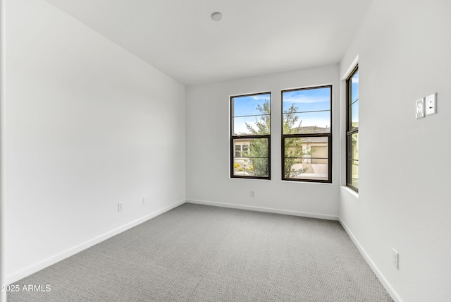 4128 Desert Moon Dr, Wickenburg, AZ 85390 - empty room featuring carpet floors and baseboards