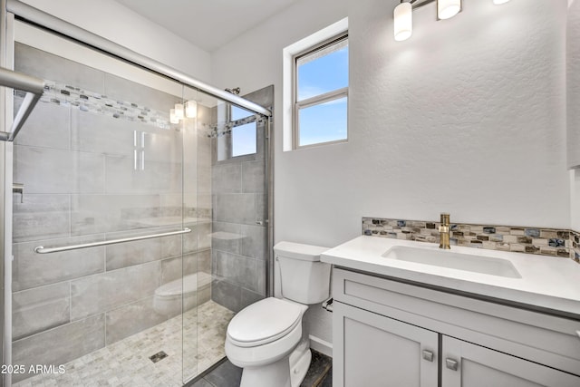 4128 Desert Moon Dr, Wickenburg, AZ 85390 - bathroom with toilet, vanity, and a shower stall