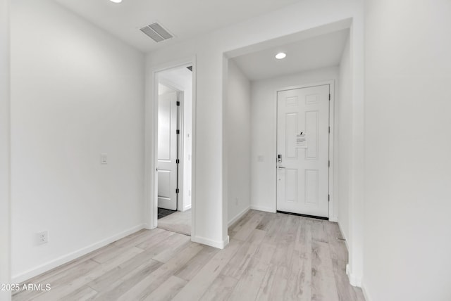 4128 Desert Moon Dr, Wickenburg, AZ 85390 - foyer featuring wood finished floors, recessed lighting, and baseboards