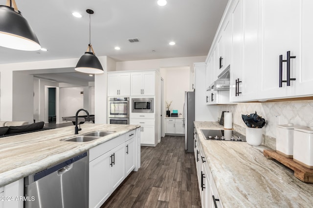 kitchen featuring white cabinetry, appliances with stainless steel finishes, dark wood-type flooring, and sink