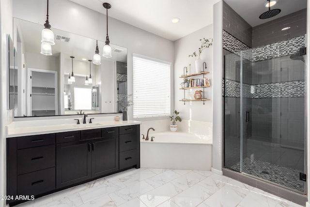 bathroom featuring vanity and separate shower and tub