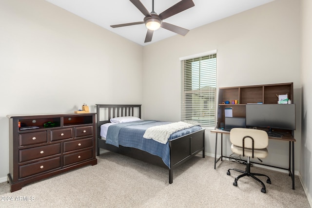 bedroom with ceiling fan and light carpet