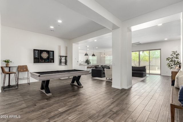 rec room featuring pool table, a chandelier, and hardwood / wood-style floors