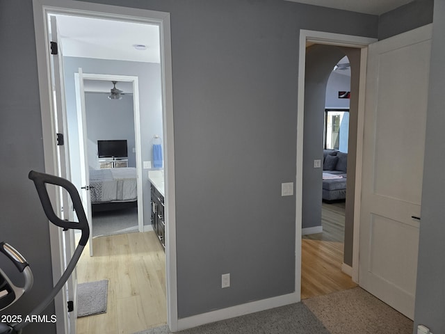 corridor featuring light hardwood / wood-style floors