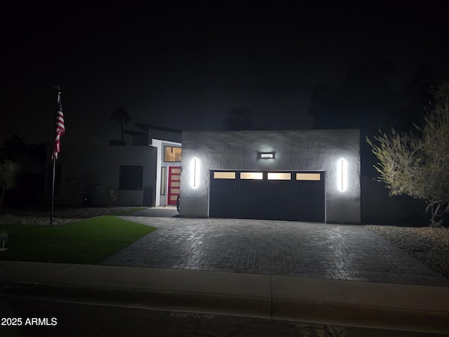 modern home featuring a garage