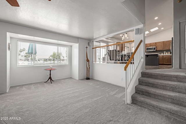 1146 W Sea Fog Dr, Gilbert, AZ 85233 - staircase featuring carpet flooring, baseboards, and ceiling fan