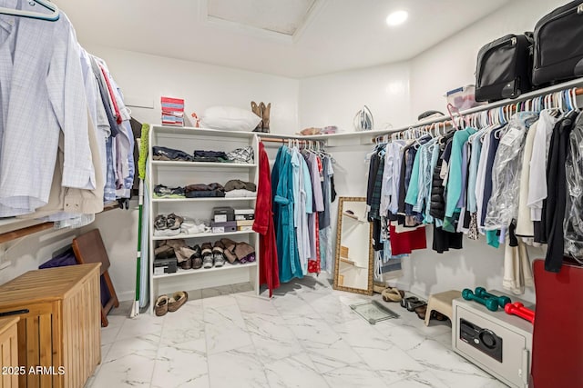 1146 W Sea Fog Dr, Gilbert, AZ 85233 - spacious closet featuring attic access and marble finish flooring
