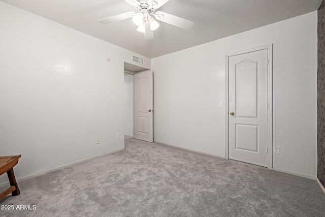 1146 W Sea Fog Dr, Gilbert, AZ 85233 - unfurnished bedroom featuring carpet, ceiling fan, and baseboards