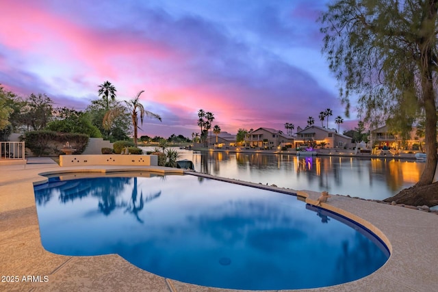 1146 W Sea Fog Dr, Gilbert, AZ 85233 - pool at dusk with a water view, an infinity pool, and a residential view