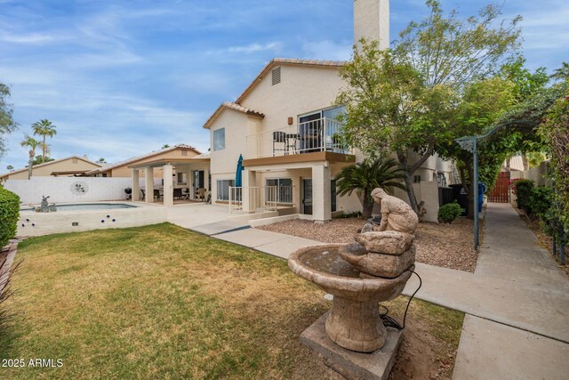 1146 W Sea Fog Dr, Gilbert, AZ 85233 - rear view of property with a balcony, stucco siding, a patio, a chimney, and a tile roof