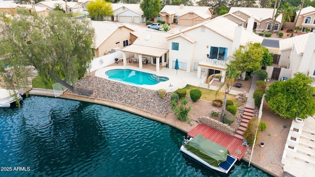 1146 W Sea Fog Dr, Gilbert, AZ 85233 - outdoor pool featuring a residential view, a fenced backyard, a patio area, and a boat dock