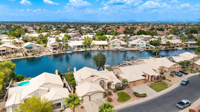 1146 W Sea Fog Dr, Gilbert, AZ 85233 - aerial perspective of suburban area with a nearby body of water