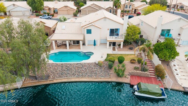 1146 W Sea Fog Dr, Gilbert, AZ 85233 - view of pool featuring a residential view, a patio area, and a pool with connected hot tub