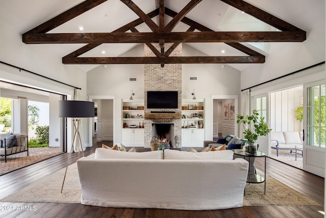 living room featuring a fireplace, beam ceiling, high vaulted ceiling, and dark wood-type flooring