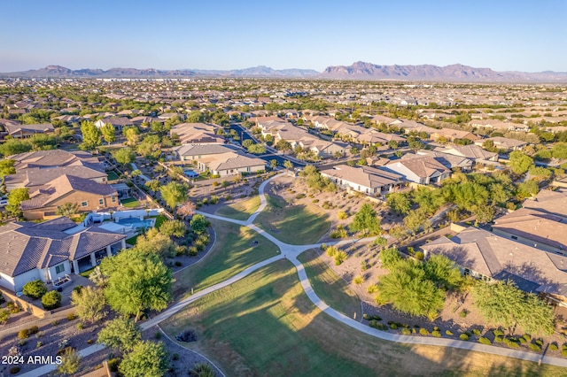 birds eye view of property featuring a mountain view