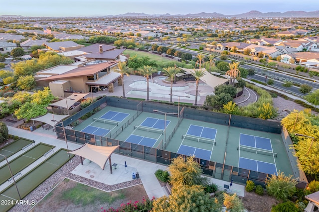 birds eye view of property featuring a mountain view