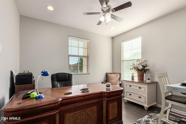 tiled office with ceiling fan and a healthy amount of sunlight