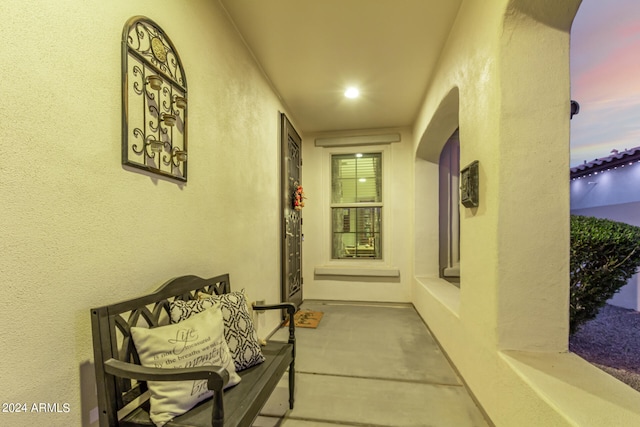 hallway featuring concrete flooring