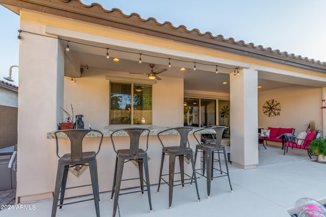 view of patio featuring a bar