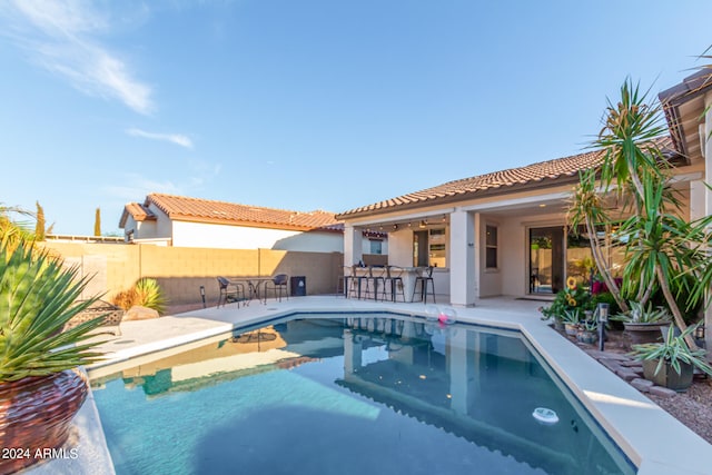 view of pool featuring a patio