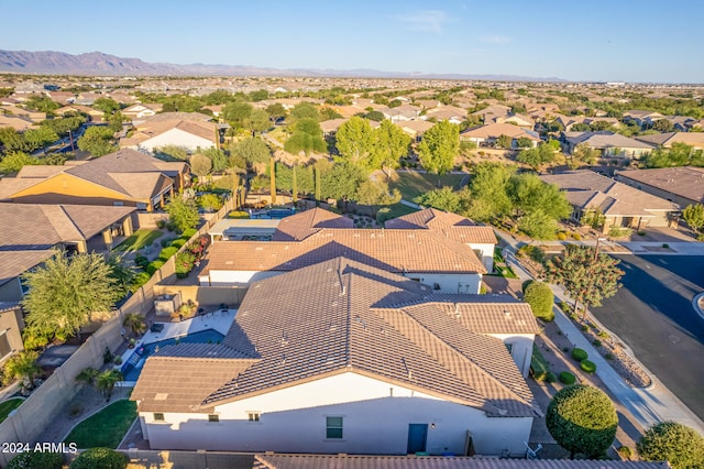 drone / aerial view featuring a mountain view