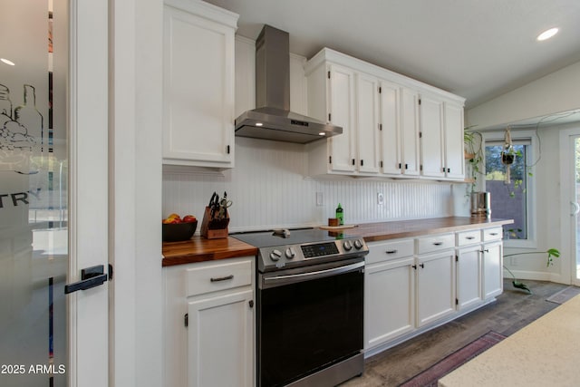 kitchen featuring white cabinetry, wall chimney exhaust hood, dark wood-type flooring, and electric range