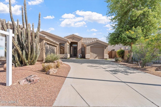 4667 E County Down Dr, Chandler, AZ 85249 - view of front of home featuring a garage, driveway, stucco siding, and a tile roof