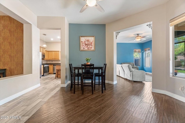 4667 E County Down Dr, Chandler, AZ 85249 - dining area with a ceiling fan and wood finished floors