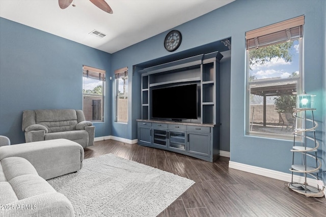 4667 E County Down Dr, Chandler, AZ 85249 - living area featuring ceiling fan, healthy amount of natural light, and dark wood-type flooring