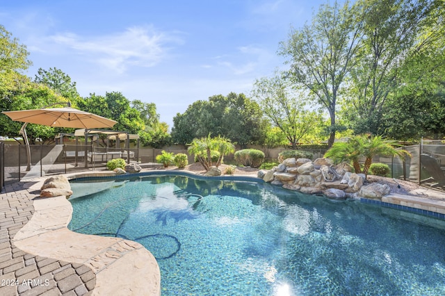 view of pool featuring a patio area