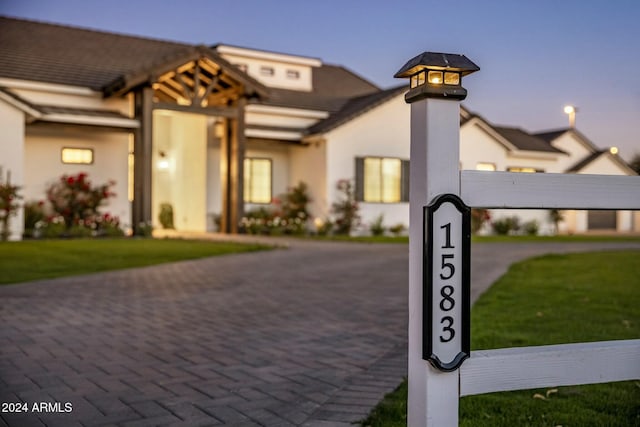 view of front of home with a yard