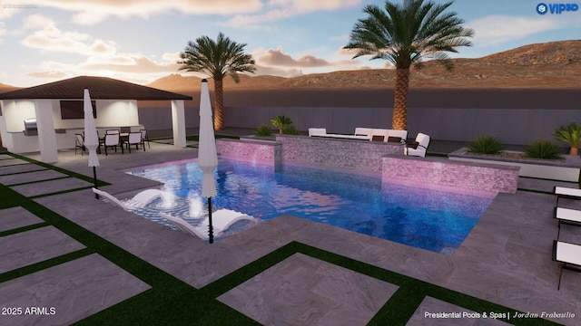 pool at dusk featuring a patio