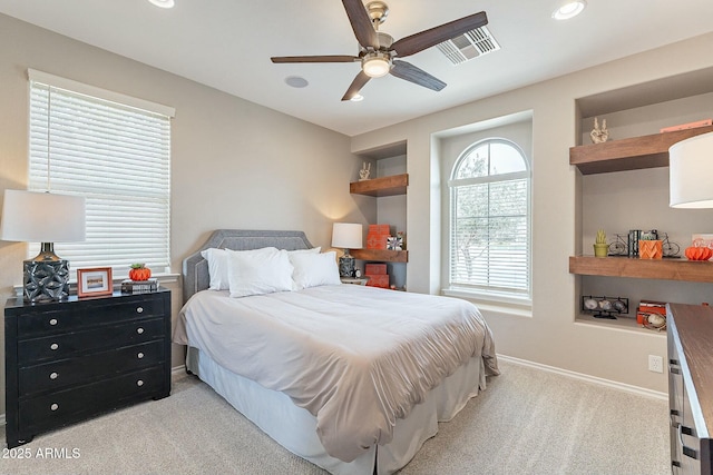 bedroom featuring visible vents, a ceiling fan, recessed lighting, carpet floors, and baseboards