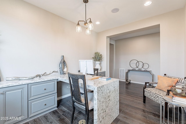 dining room with visible vents, dark wood-style flooring, and baseboards