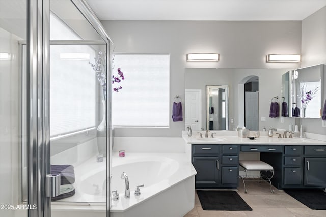2221 W Calle De Las Estrella Way, Phoenix, AZ 85085 - full bath featuring a garden tub, double vanity, a shower stall, and tile patterned flooring