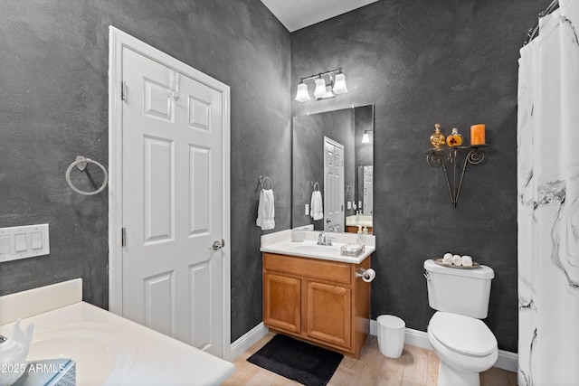 2221 W Calle De Las Estrella Way, Phoenix, AZ 85085 - full bathroom with vanity and wood finished floors