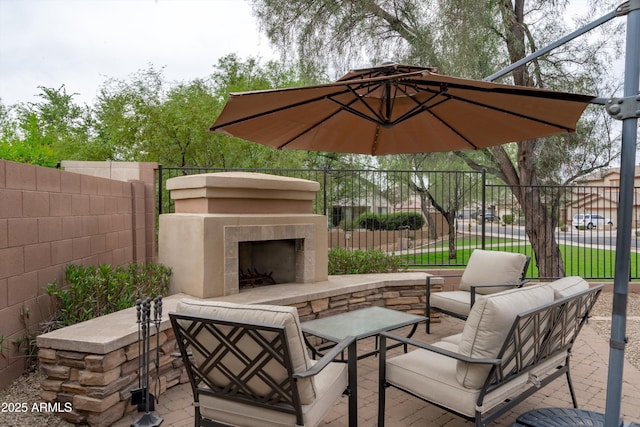 2221 W Calle De Las Estrella Way, Phoenix, AZ 85085 - view of patio featuring an outdoor living space with a fireplace