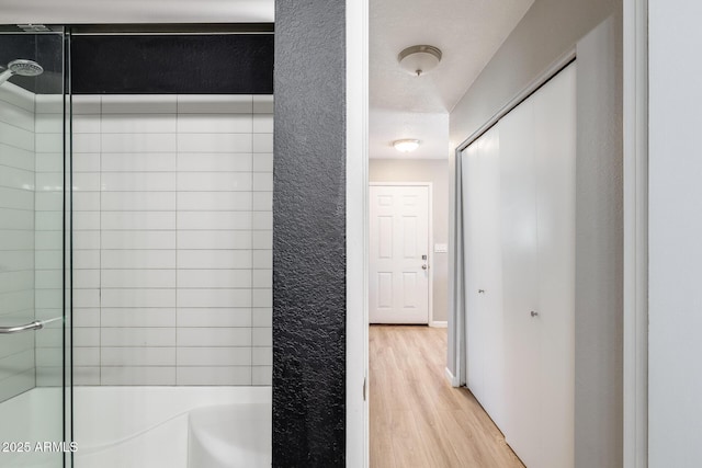 full bath with wood finished floors