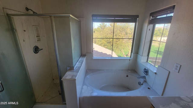 bathroom featuring plus walk in shower