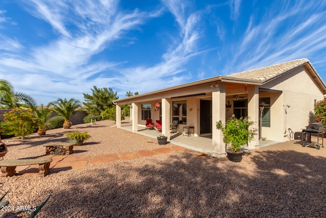 back of house featuring a patio area