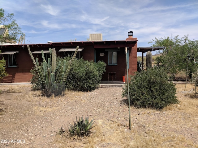 view of pueblo revival-style home