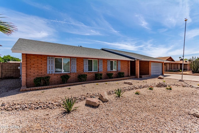 5721 W Palo Verde Ave, Glendale, AZ 85302 - ranch-style house featuring an attached garage, concrete driveway, and a shingled roof