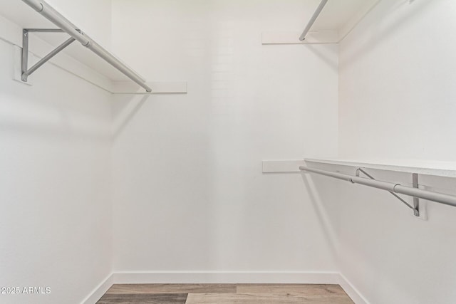 5721 W Palo Verde Ave, Glendale, AZ 85302 - spacious closet with light wood-style floors
