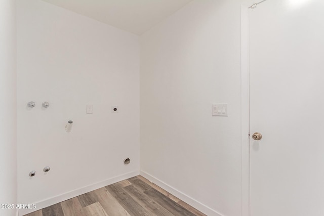 5721 W Palo Verde Ave, Glendale, AZ 85302 - washroom with hookup for a gas dryer, electric dryer hookup, light wood-type flooring, and baseboards