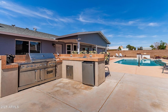 5721 W Palo Verde Ave, Glendale, AZ 85302 - fenced backyard featuring a patio and an outdoor bar