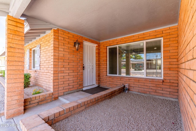 5721 W Palo Verde Ave, Glendale, AZ 85302 - view of exterior entry featuring brick siding