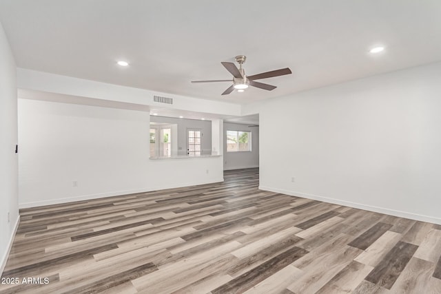 5721 W Palo Verde Ave, Glendale, AZ 85302 - unfurnished room featuring ceiling fan, wood finished floors, recessed lighting, and baseboards
