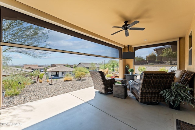 view of patio featuring ceiling fan