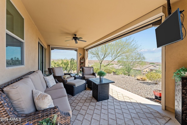 view of patio / terrace featuring ceiling fan and outdoor lounge area